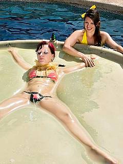 Subgirl is bound with bizarre vacuum latex device and floating helplessly in the pool