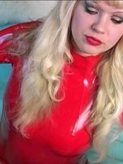 Latex goddess is let her slave out of the steel cock cage he was wearing and now sucking his dick passionately